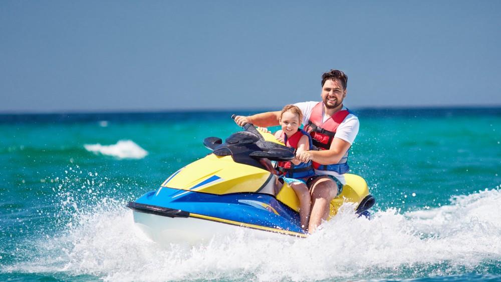 Jet ski riders on the ocean in Zanzibar